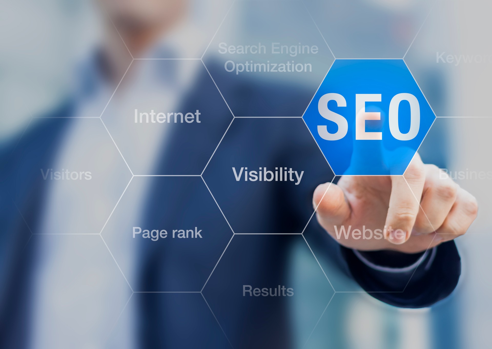 Search Engine Optimization consultant touching SEO button